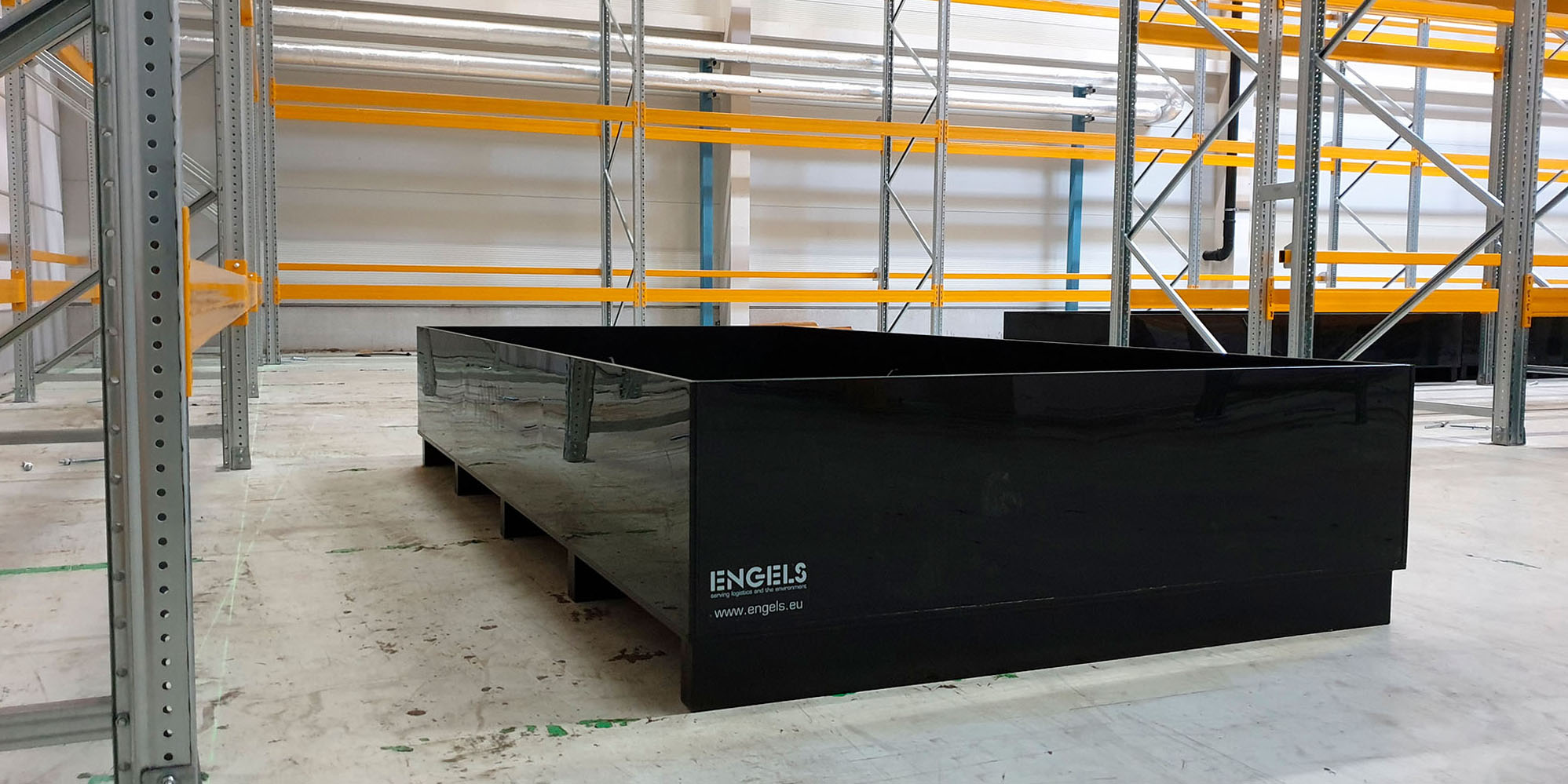 Bacs de rétention pour des IBC stockés sur racks